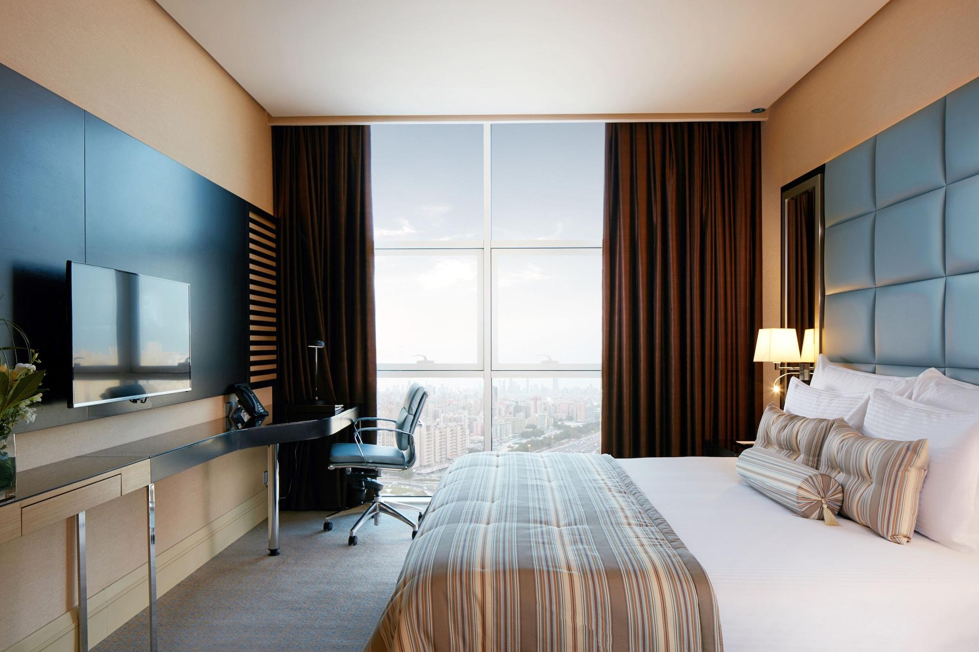 Millennium Hotel & Convention Centre Kuwait Kuveyt Dış mekan fotoğraf A bedroom at the hotel