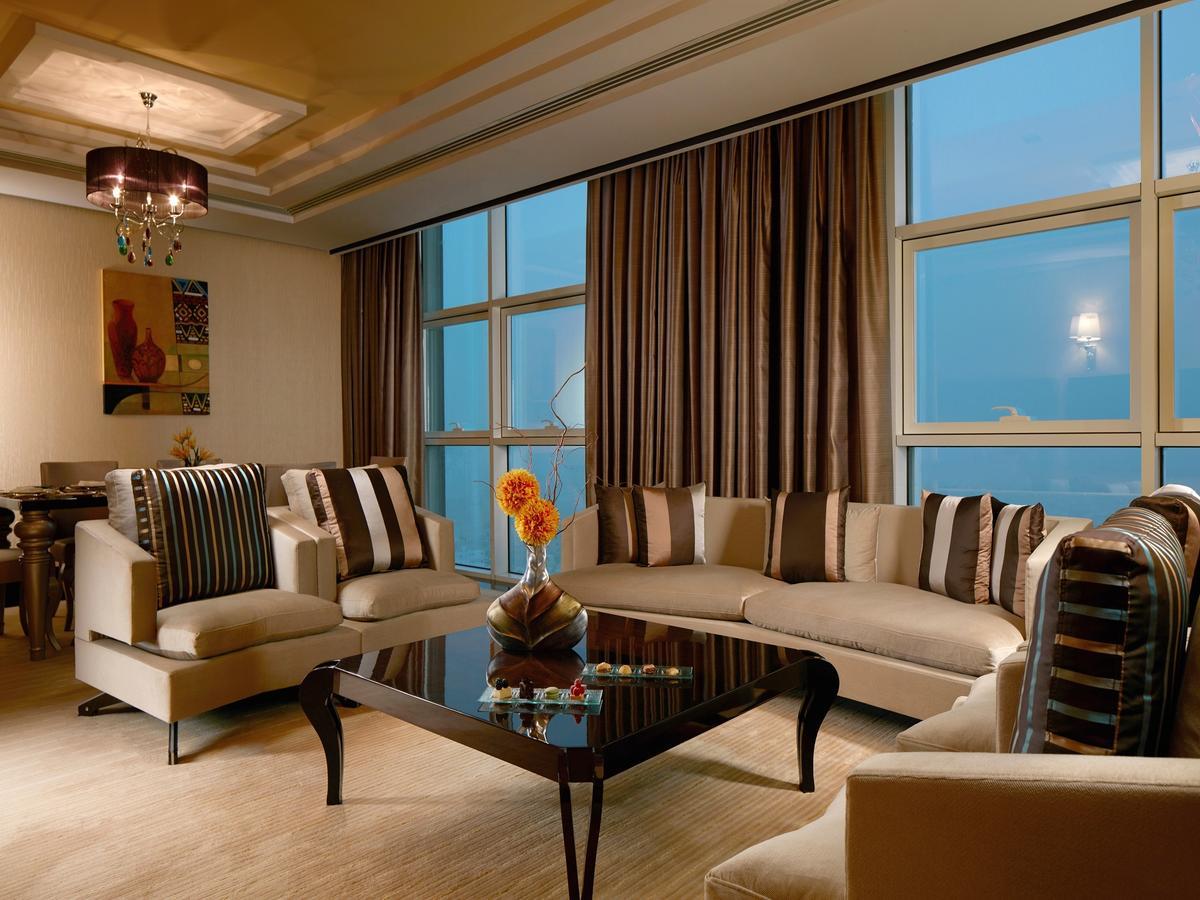 Millennium Hotel & Convention Centre Kuwait Kuveyt Dış mekan fotoğraf A living room in a suite at the Jumeirah Emirates Towers Hotel